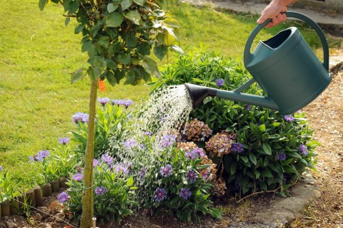 Professional gardening team resolving a client concern