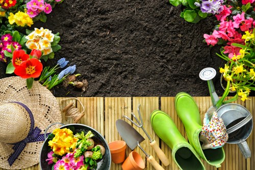 A gardener assessing a quotation and booking details
